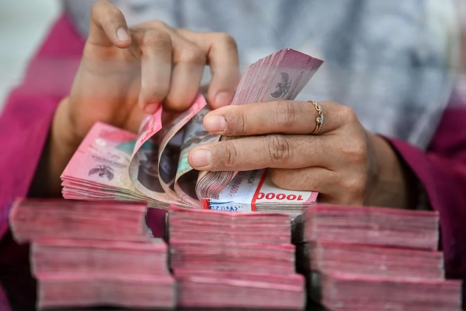 Rupiah Menguat Tipis di Tengah Ketegangan Timur Tengah dan Kebijakan The Fed