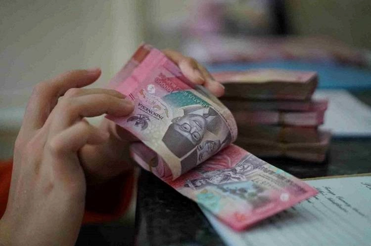 Rupiah Tertekan, Diprediksi Menyentuh Rp18.010 per Dolar AS Hari Ini