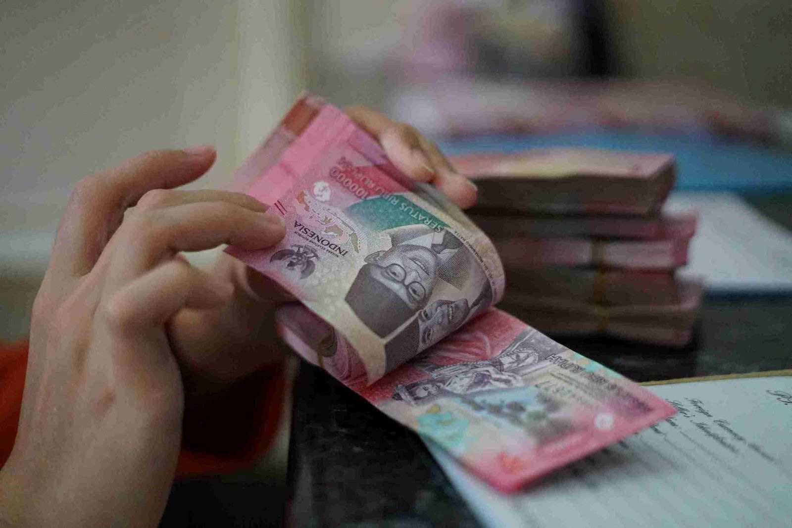 Rupiah Menyentuh Rp17.732, Ekonom Trimegah Minta BI Ambil Tindakan Lebih Tegas