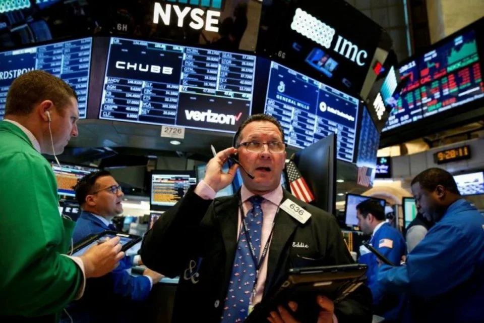 Lonjakan Wall Street Didukung Laporan Keuangan Positif Emiten